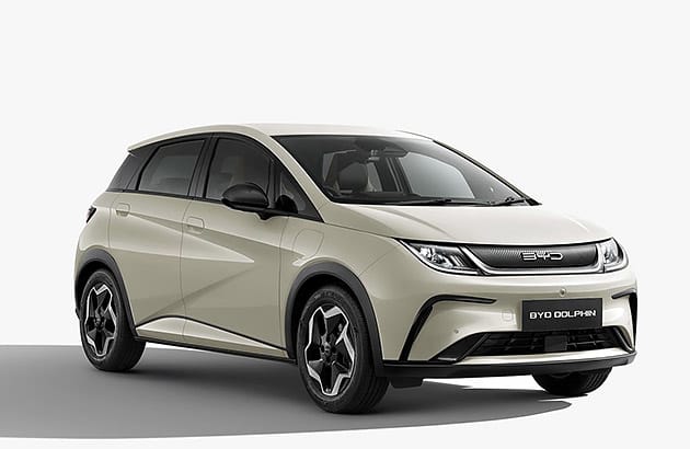 A white BYD Dolphin electric car against a white background