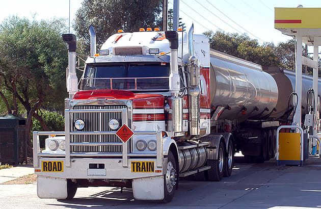 A road train at a service station