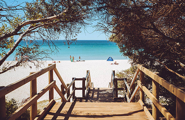 Wooden stairs leading down to the beach in Dunsborough