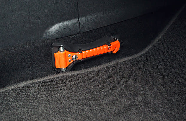 A glass hammer stored in a car