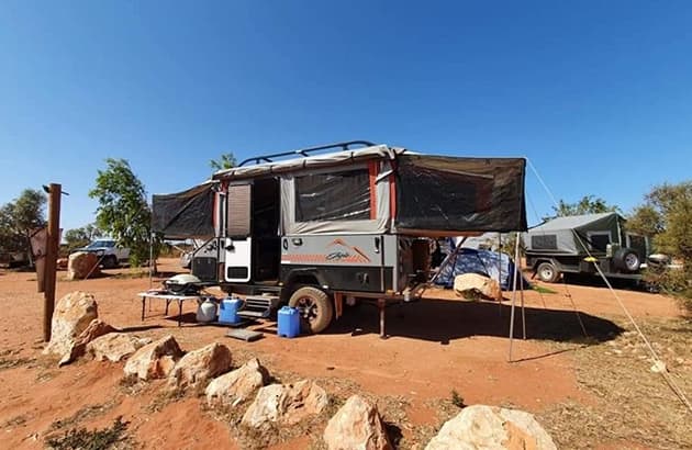 An off-road caravan setup in regional Australia