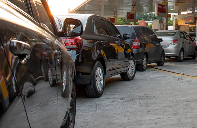 Cars queuing for petrol
