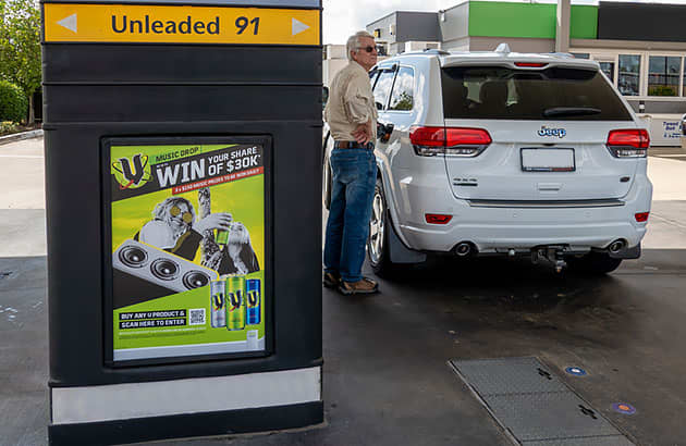 Motorist refuelling car