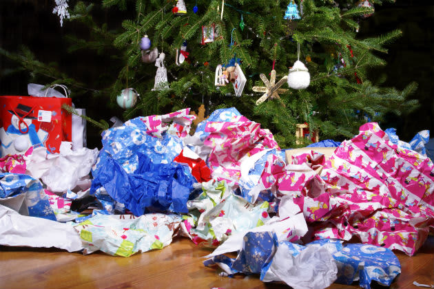 Screwed up wrapping paper under the Christmas tree