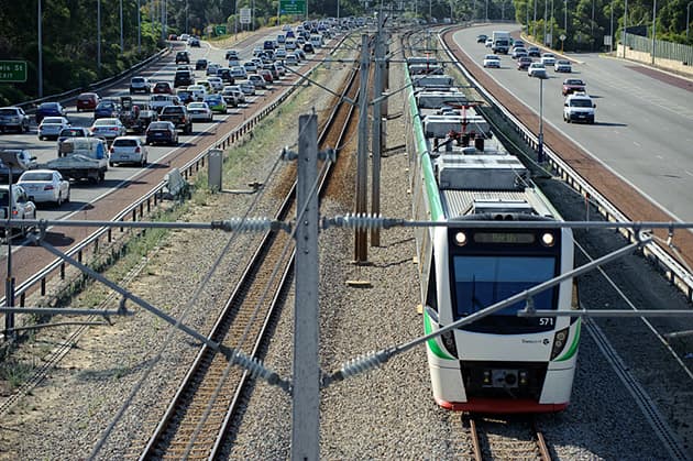 Perth train on freeway line