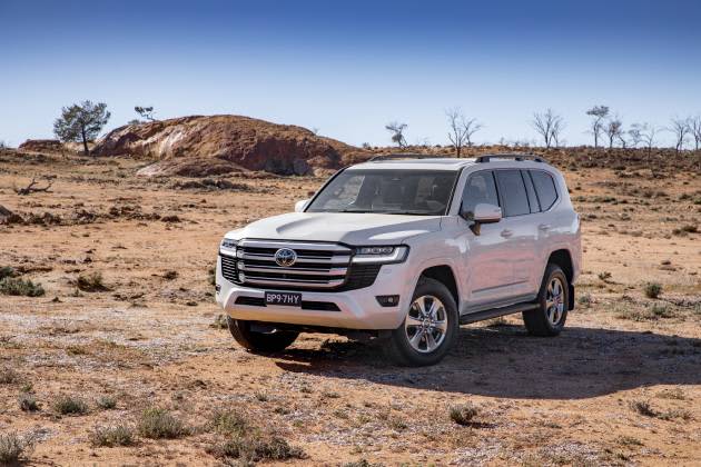White Toyota Landcruiser 300 Series in outback setting