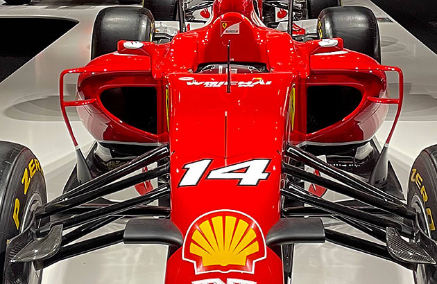 A close up of the body of a red Formula 1 car