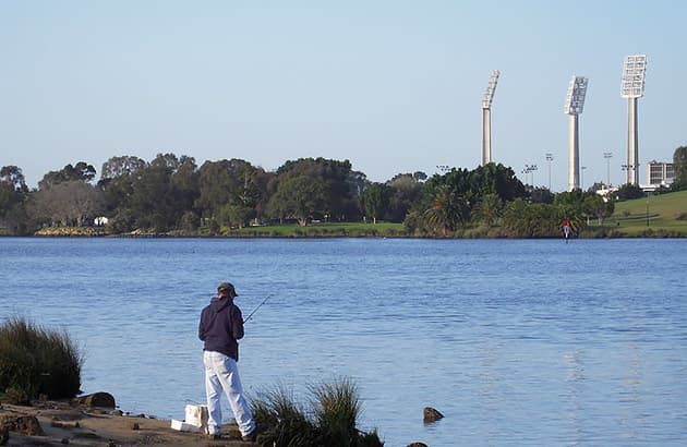Fishing on the Swan River foreshore across from Burswood