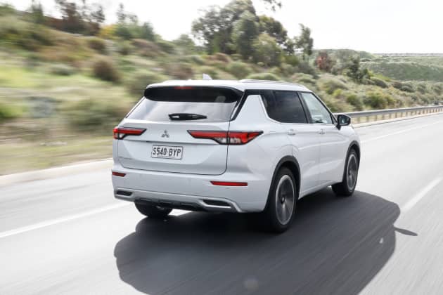 Rear of white Mitsubishi outlander