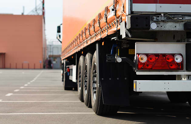 A truck parked in a car park