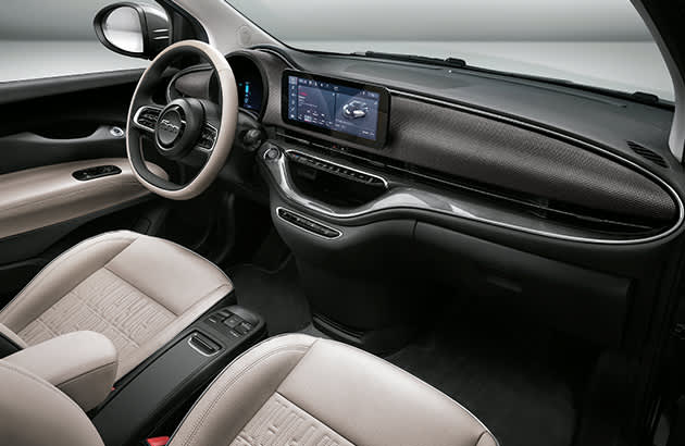 Fiat 500e plugged into electric charger
