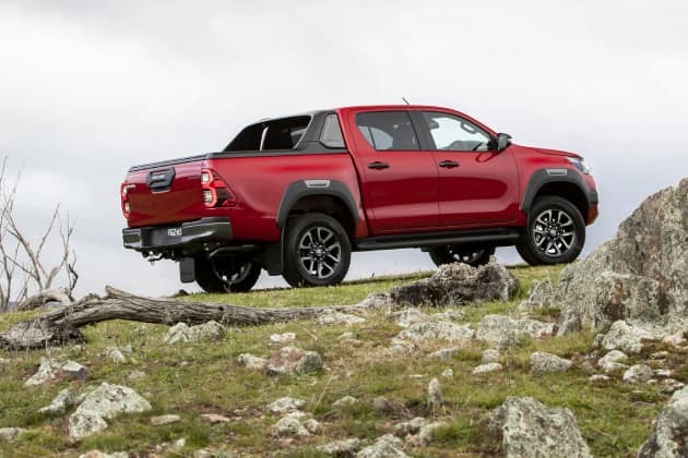 Red Toyota HiLux Rogue driving off road