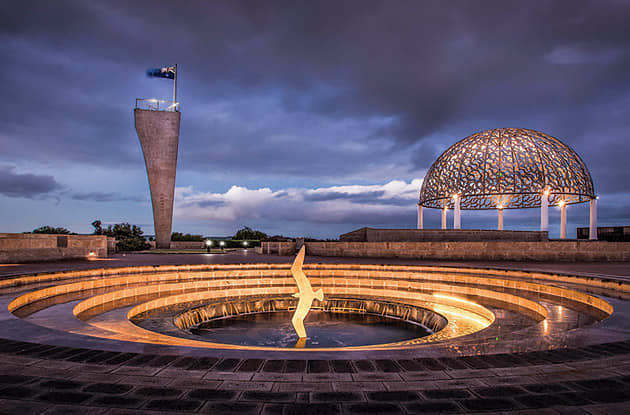 Memorial sculpture at night