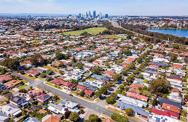 An aerial image of Perth streets with the CBD in the background