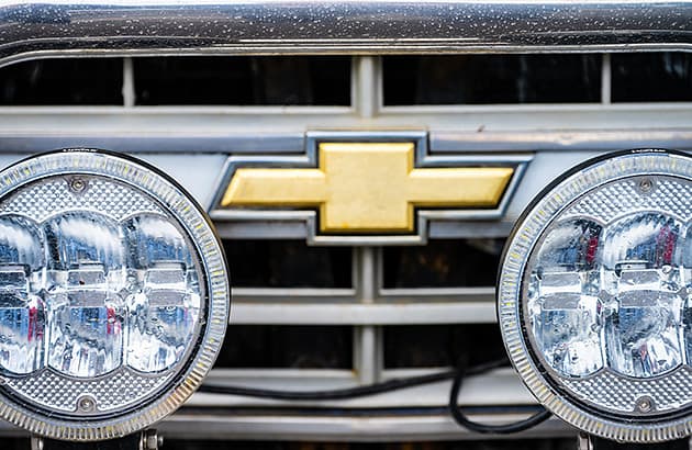close-up of a large car with extra lights fitted to the front