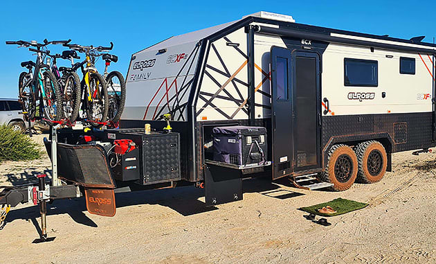 An ECX caravan with several bikes loaded on the front