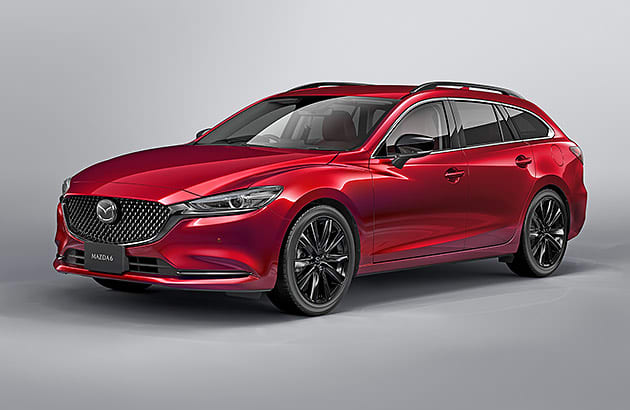 A red Mazda 6 against a white studio background