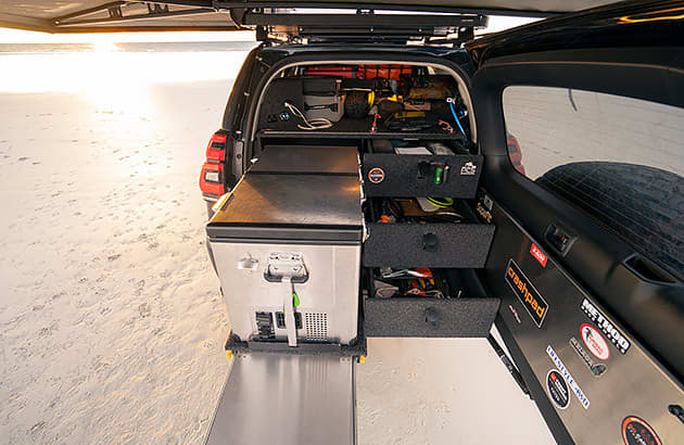 Rear view of a 4WD with a mobile kitchen installation