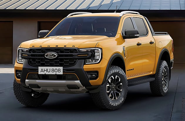 A parked yellow Ford Ranger Wildtrak