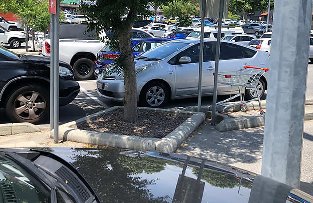 A shopping trolley bay in a shopping centre car park