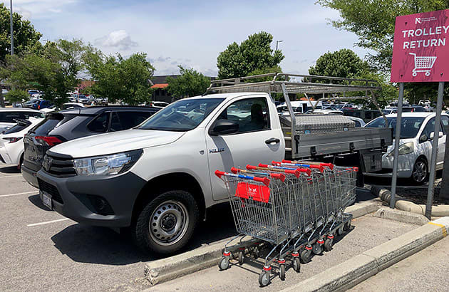 A shopping trolley bay in a shopping centre car park