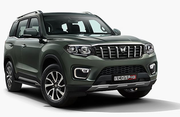 A black Mahindra Scorpio against a white studio background