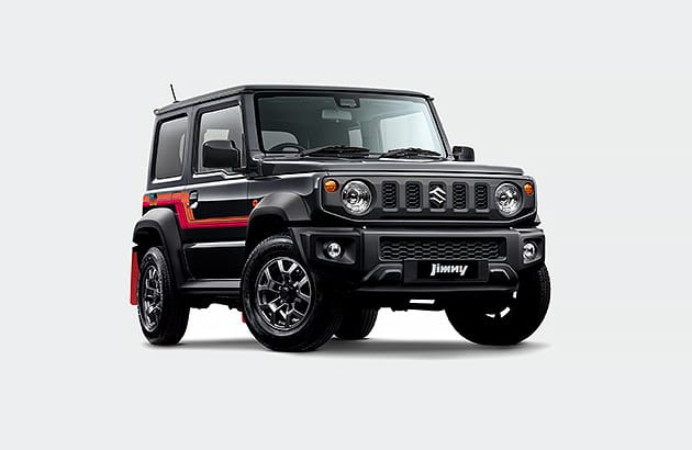 A black Suzuki Jimny against a white studio background