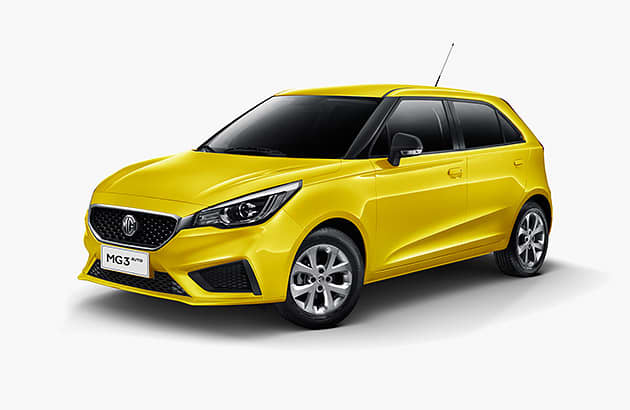 A yellow MG3 against a white studio background