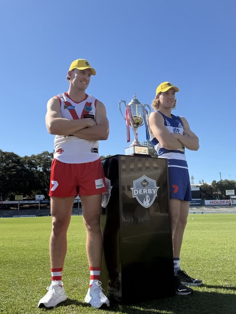 Players from each team posing with the RAC Derby trophy