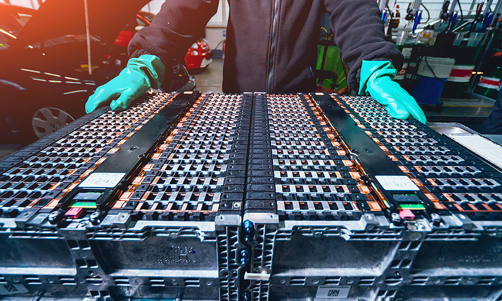 An EV battery on a workshop bench