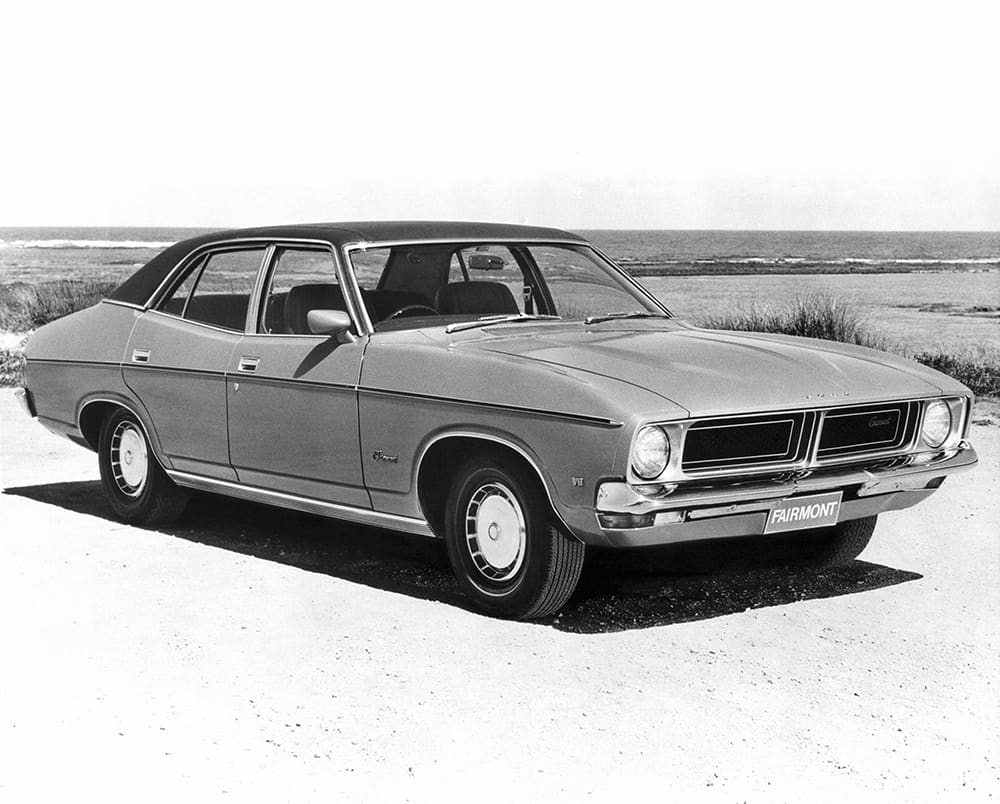 A Ford XB Falcon on a beach