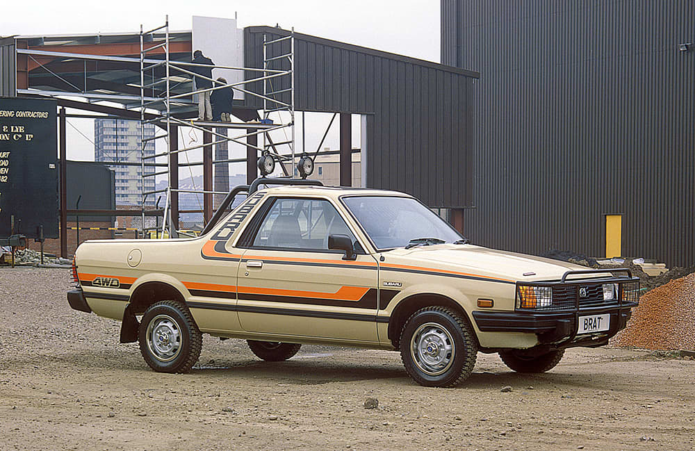 A brown Subaru Brumby on a construction site