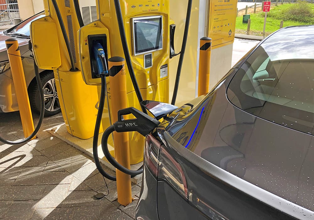 A yellow RAC EV charging station
