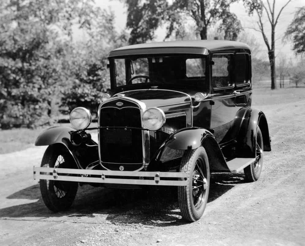 A 1931 Ford model A on a dirt track