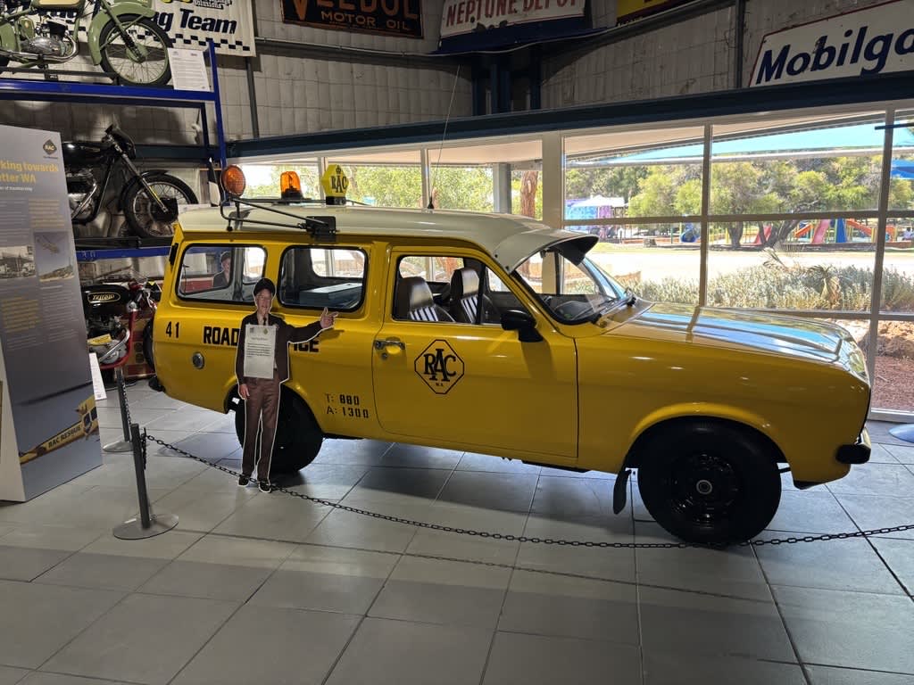 Old RAC Roadside vehicle inside museum.