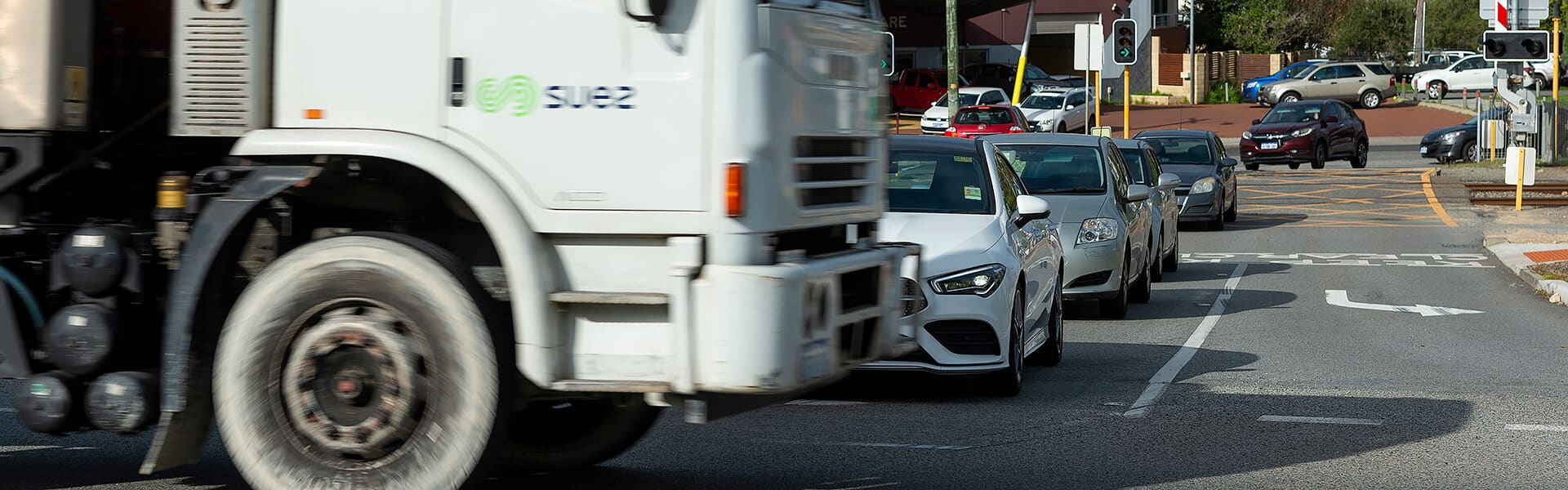 Cars crossing a busy intersection in Cottesloe WA