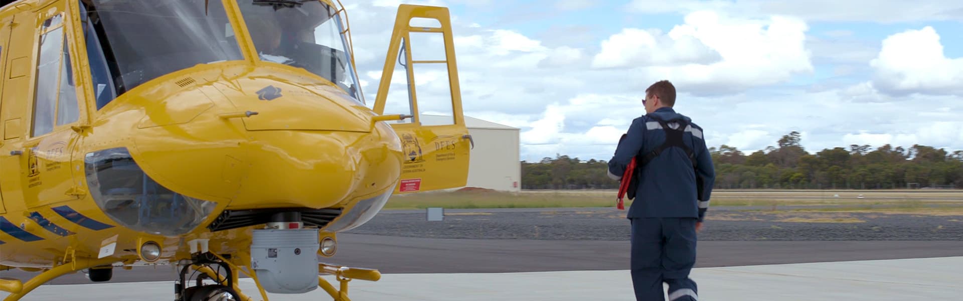 RAC Rescue pilot Chris walking to the helicopter