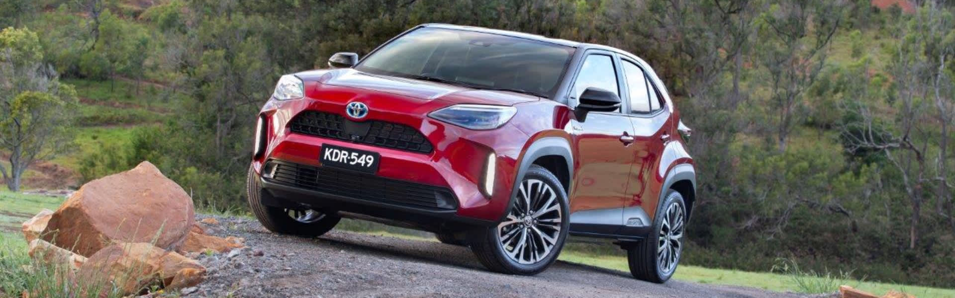 Red Toyota Yaris Cross driving off road