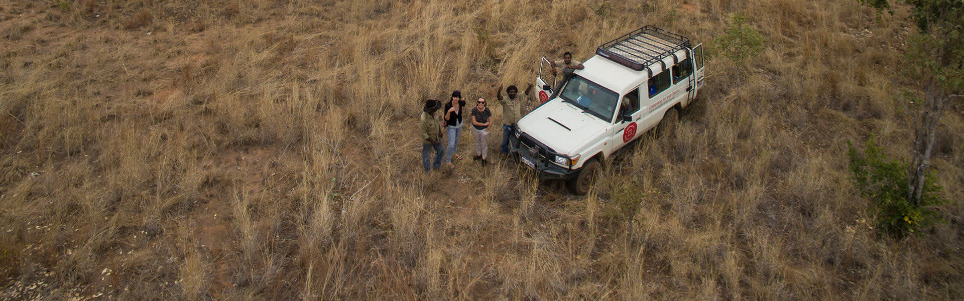 An overhead shot of tourists on a cultural tour in the Kimberley