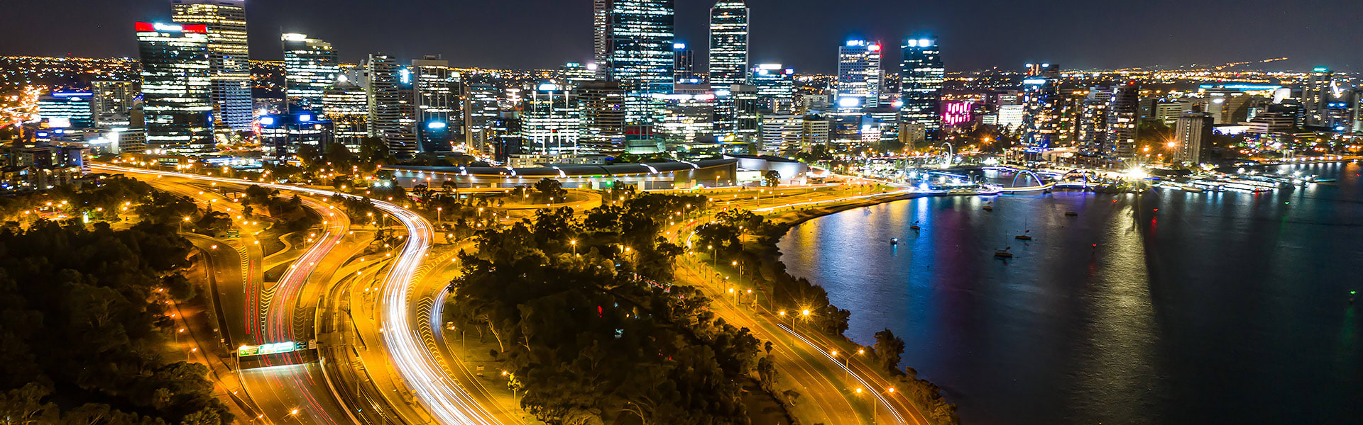 Perth city at night showing the freeway lit up