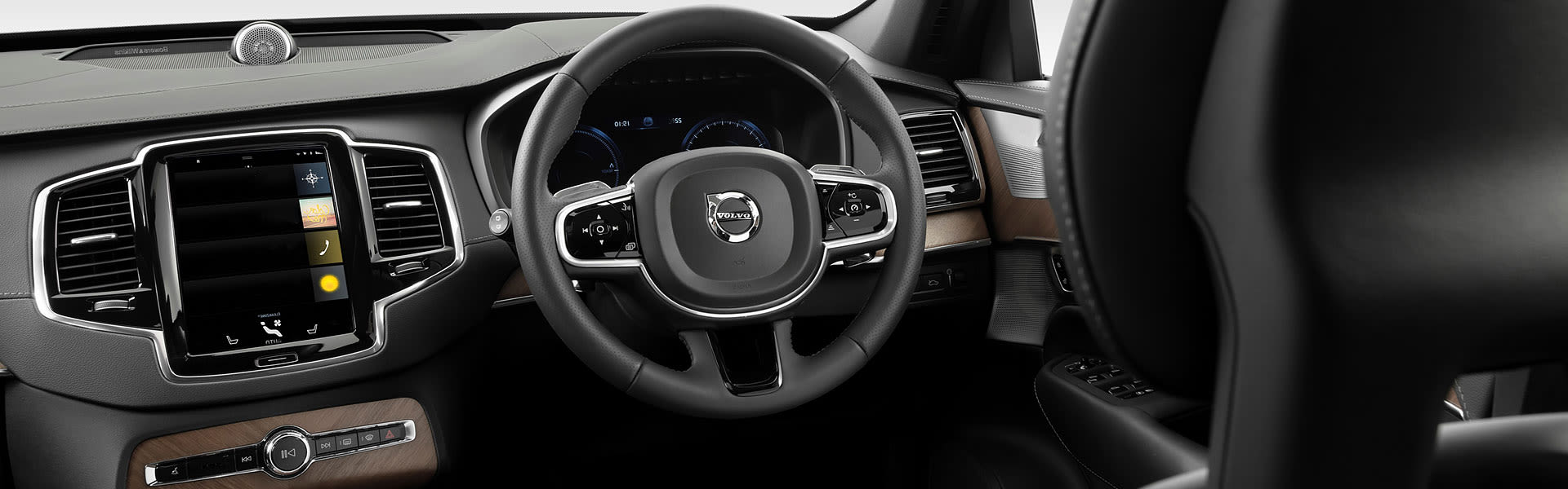 Inside a car showing steering wheel