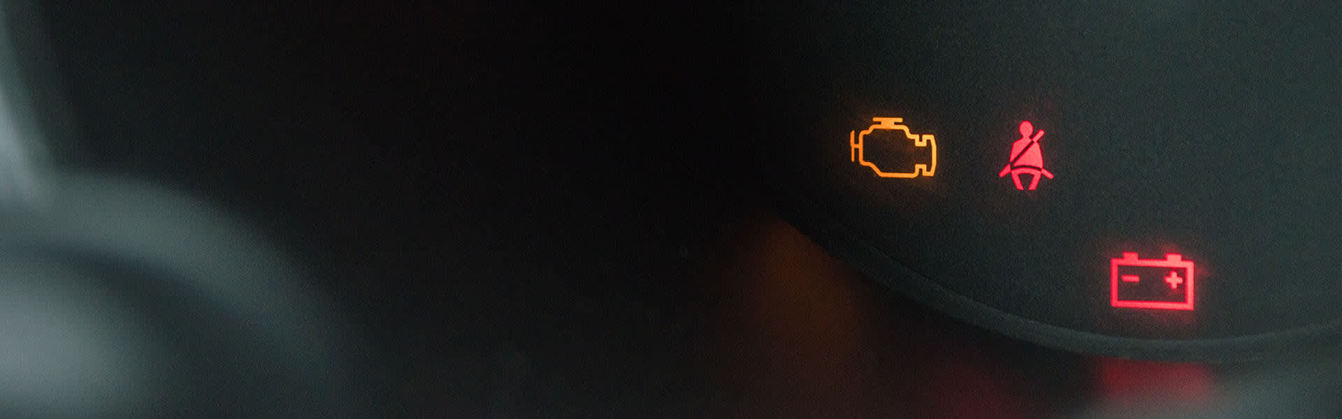 Warning lights on a car dashboard