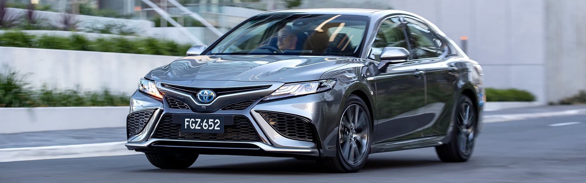 A grey 2022 Toyota Camry hybrid car