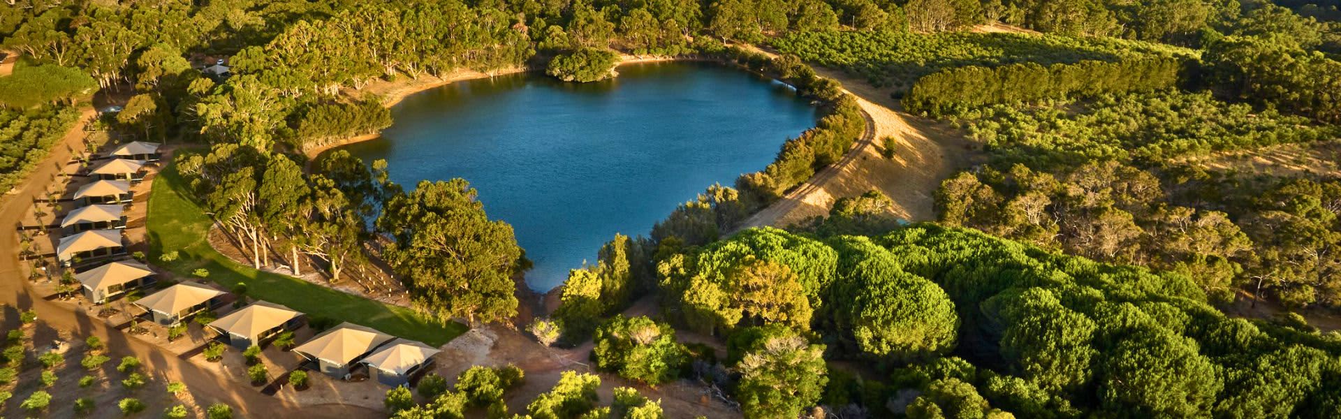 Aerial views of glamping tents at Olio Bello on the lake