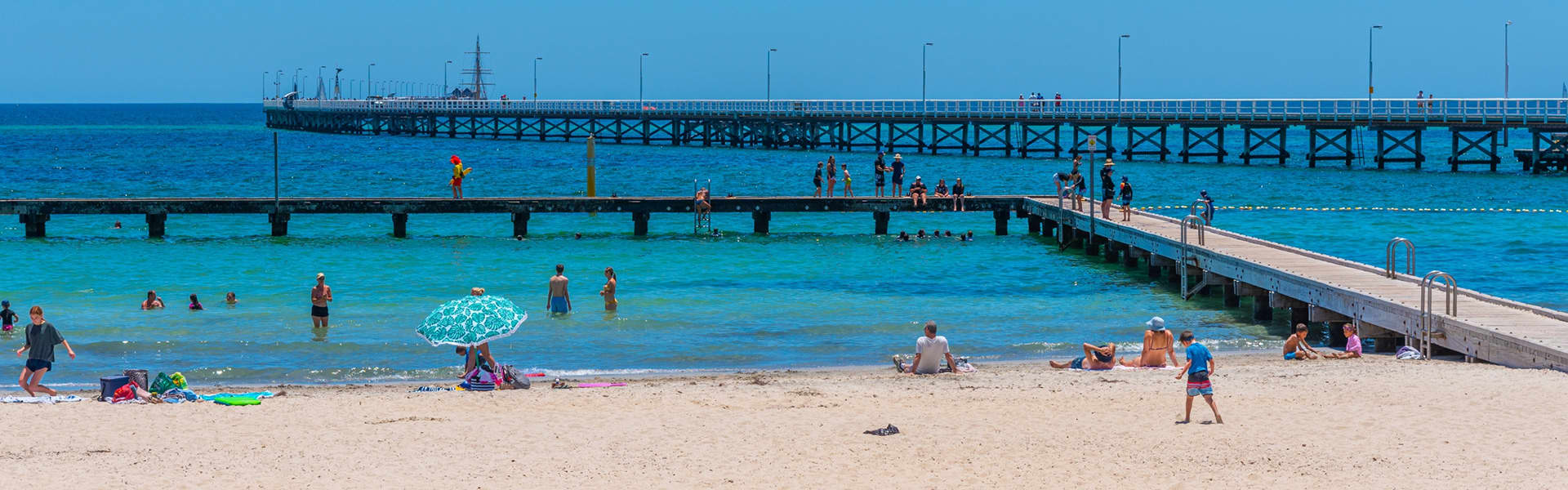 Image of people swimming at beach