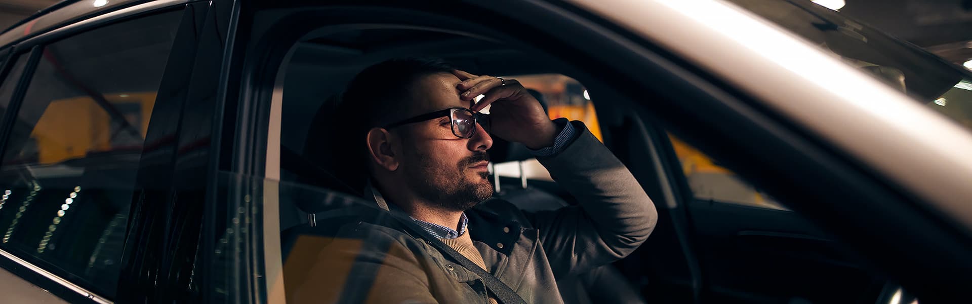 An annoyed driver waiting in a multi storey carpark