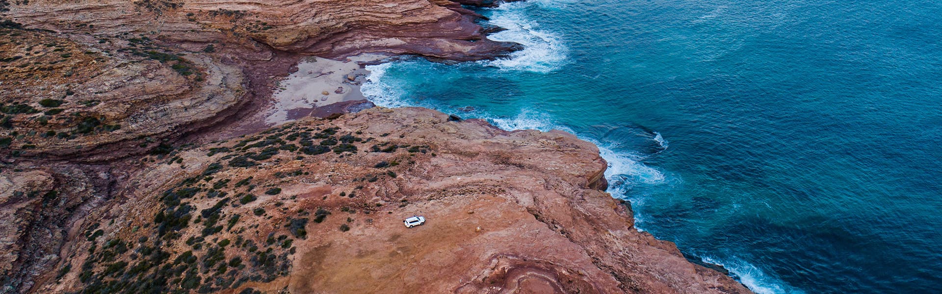 Car overlooking a lookout