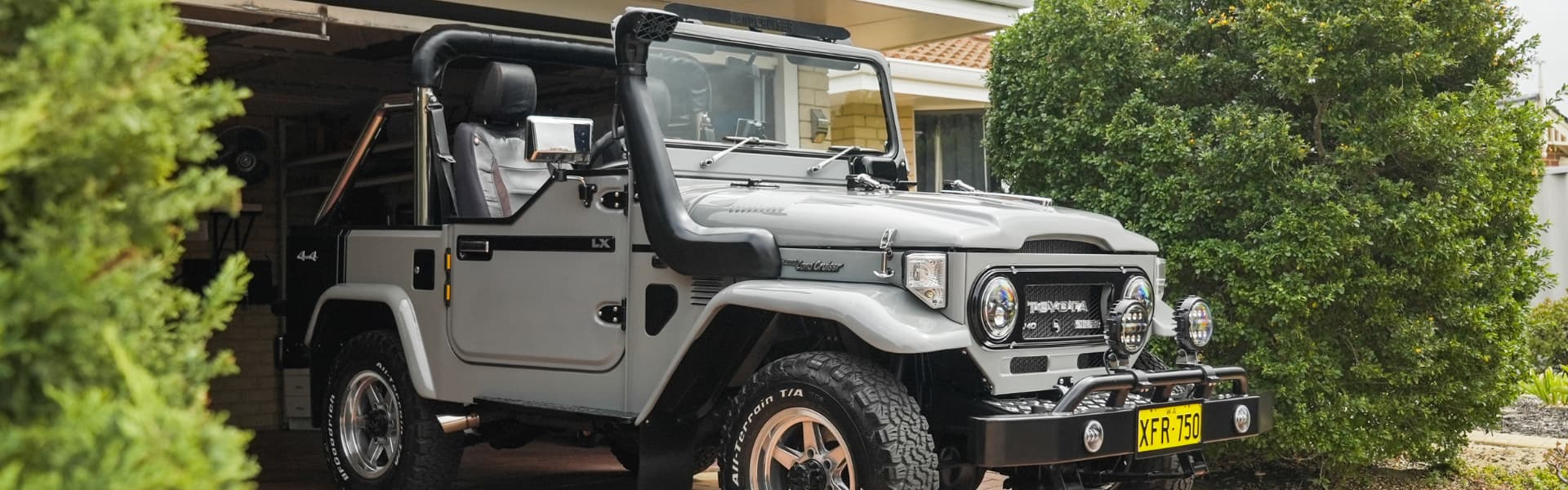 A 1979 Toyota LandCruiser BJ40 parked on a driveway