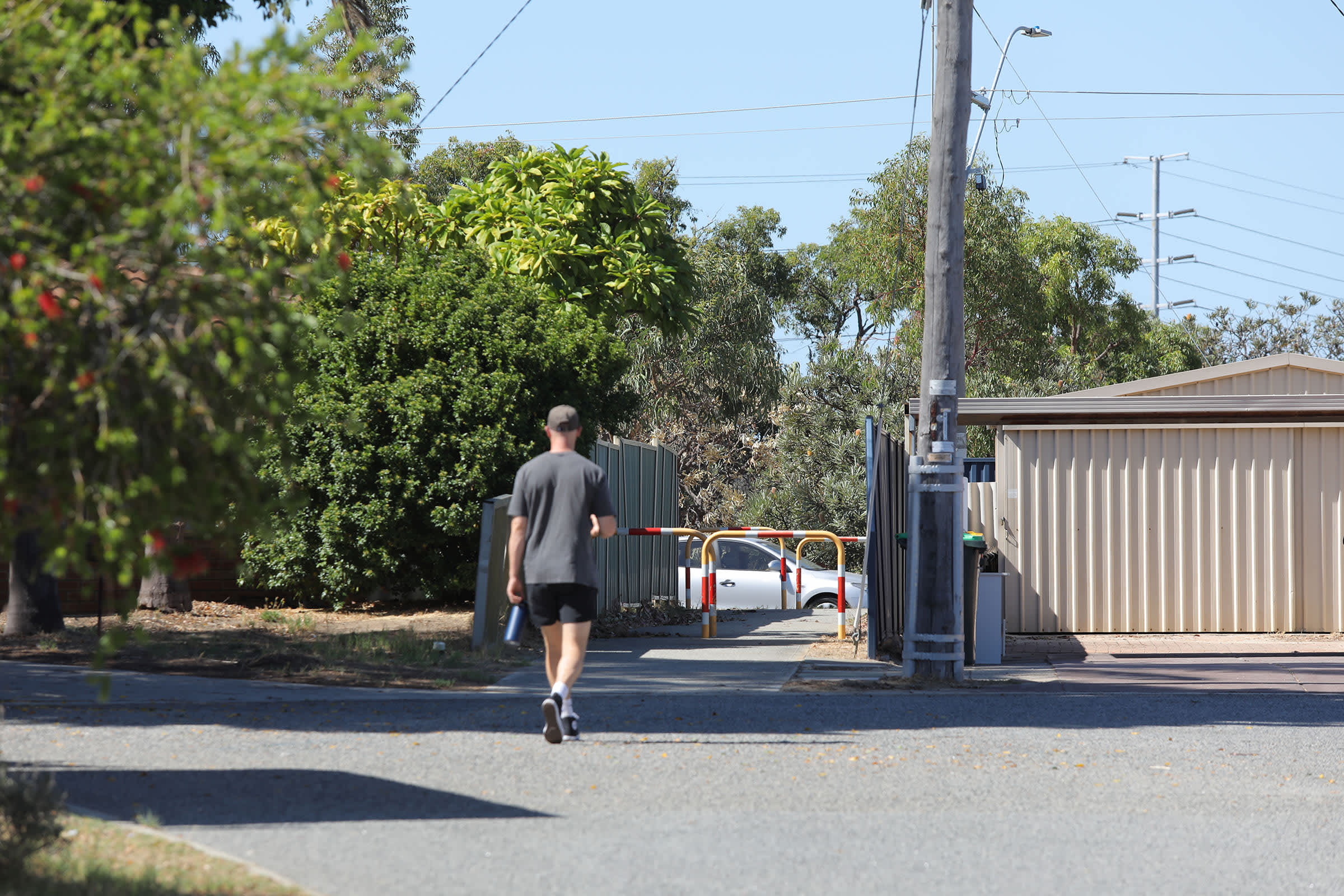 Person walking towards access way at the end of a cul de sac