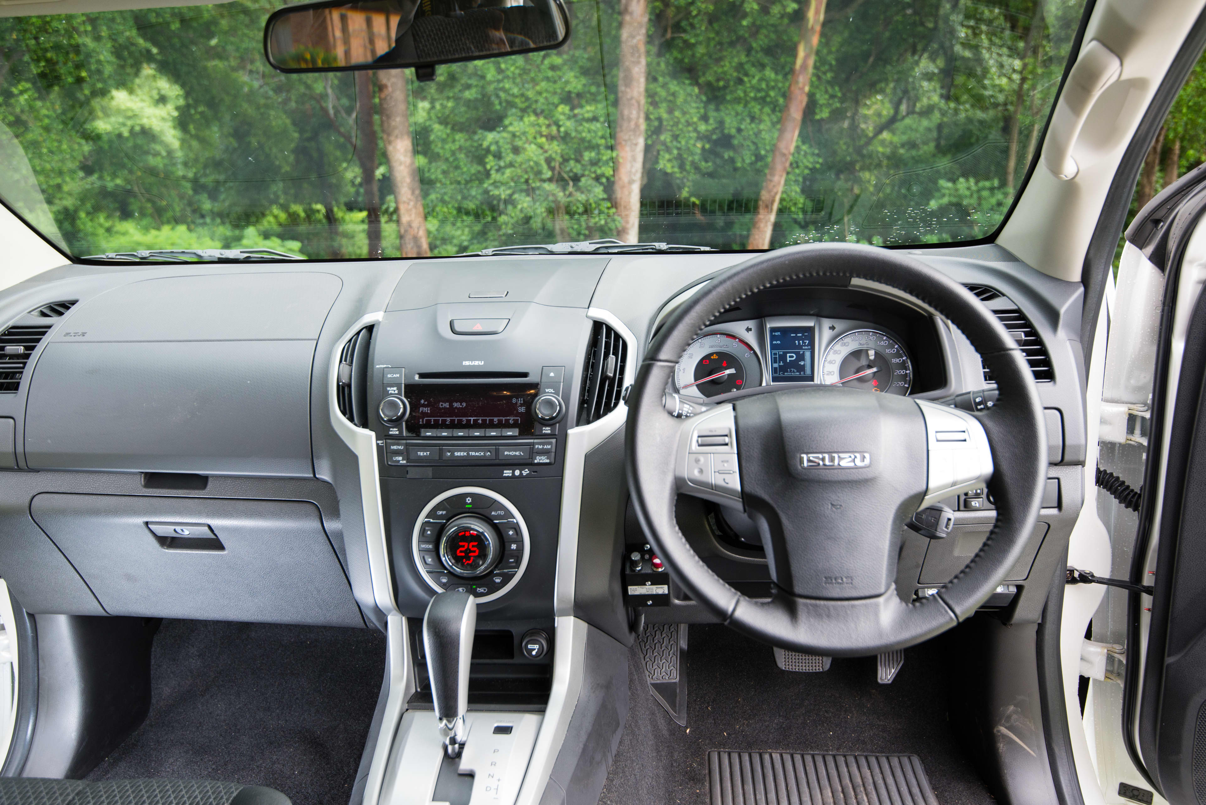 An older-style brake controller fitted near a steering wheel